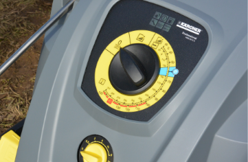 A detailed close up of a pressure washer with custom labels.