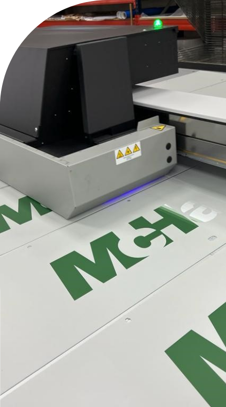 A machine is being used to print custom medical labels on a sheet of paper.