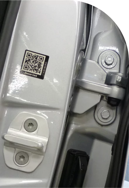 A car door handle with a qr code on it, featuring custom label solutions.