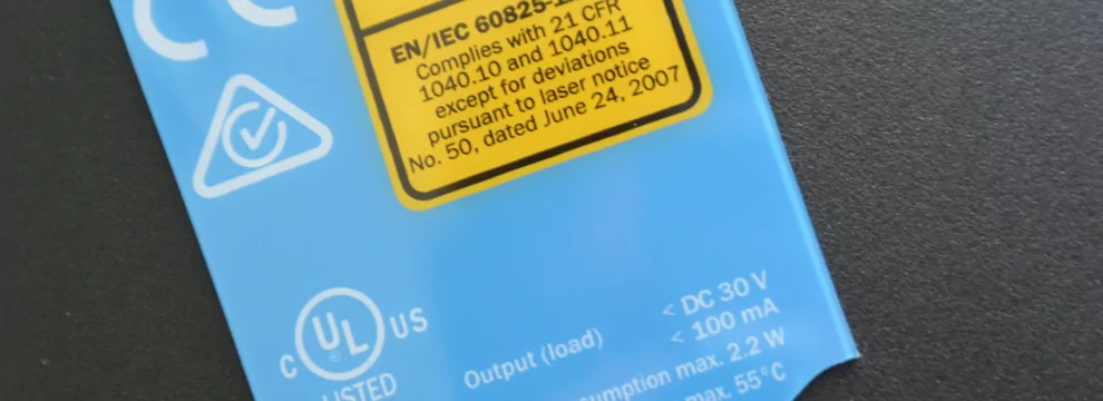 A close up of a label on a blue background.