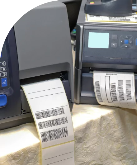 Two high quality barcode printers on a table.